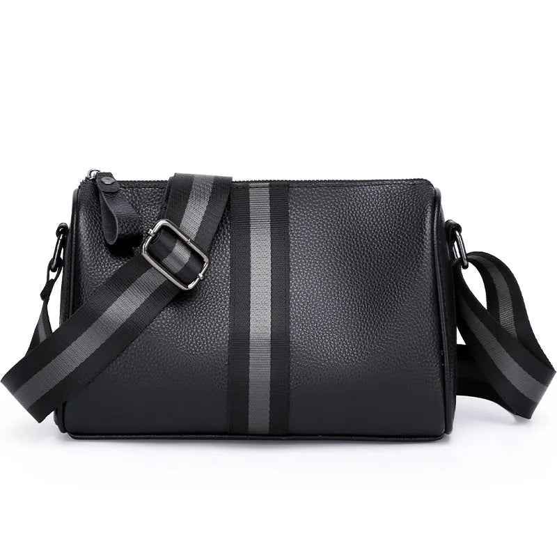 Black genuine leather one-shoulder crossbody bag showing front view and spacious interior.