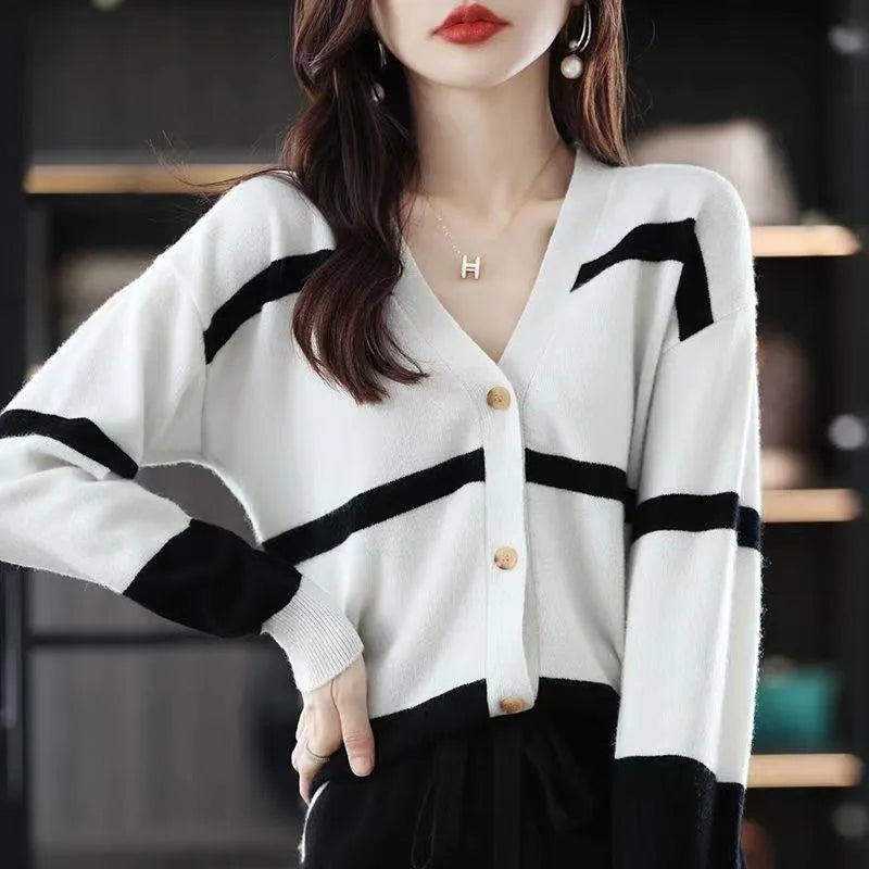 Women's slim fit striped knitted cardigan with V-neck, 3D pattern, and button front in multiple colours.