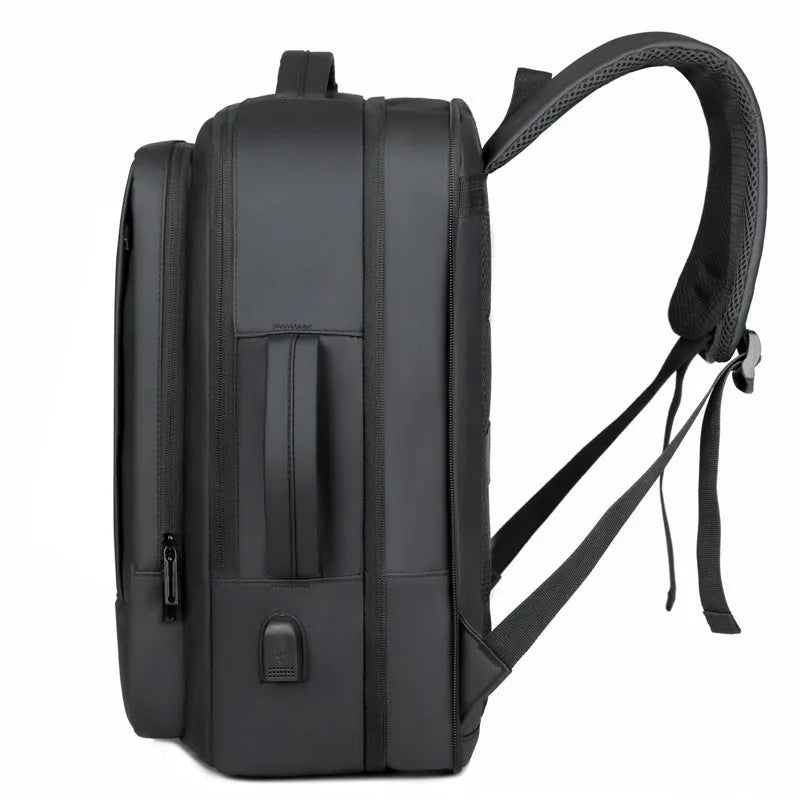 Black waterproof Oxford cloth business backpack with curved shoulder straps and derm leather accents
