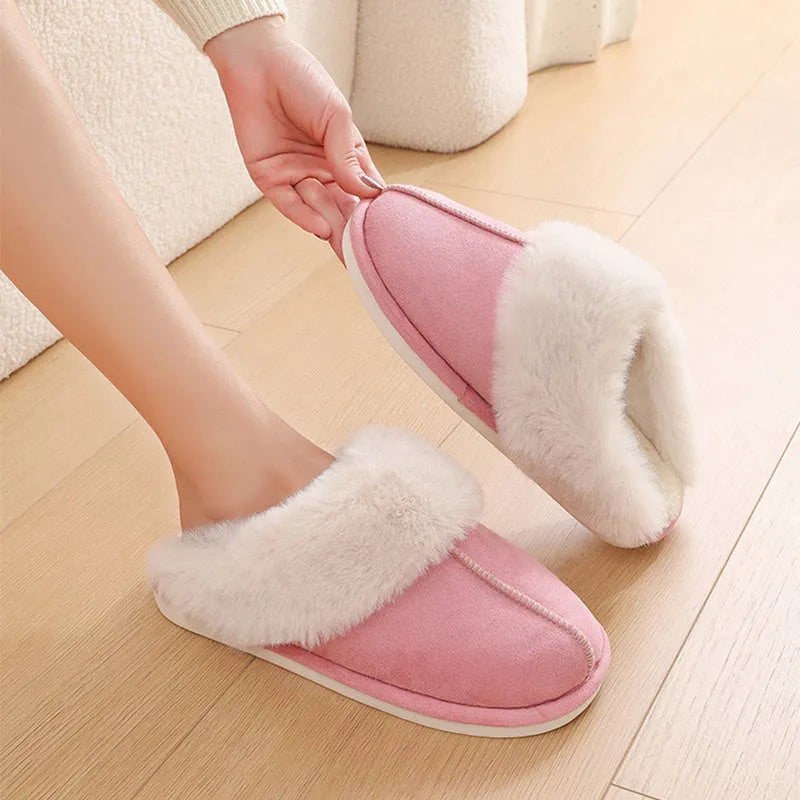 Pair of plush-lined indoor slippers with a flat PVC anti-slip sole, shown in a choice of colours.