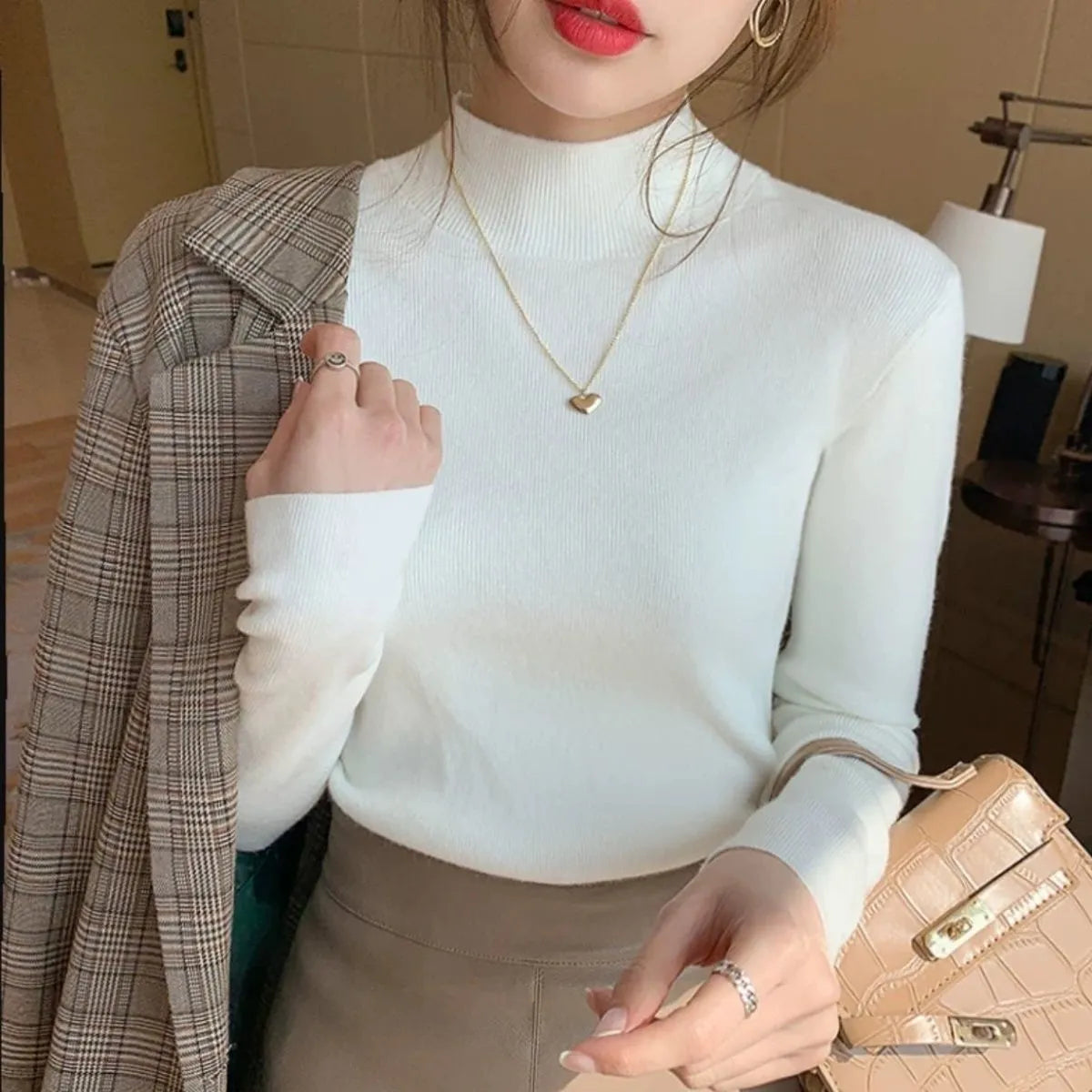 Viscose fibre slim fit Western-style long sleeve top in apricot colour showing regular sleeves and pullover design