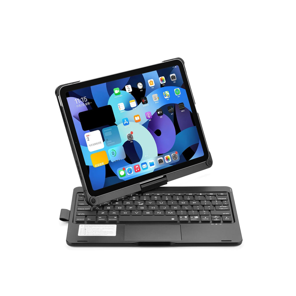Silver rotating Bluetooth keyboard with backlit keys next to an iPad.