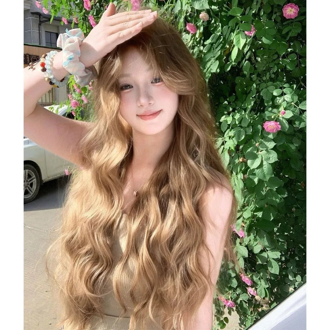 Brown linen-coloured synthetic wig with medium-length curls and included hair net