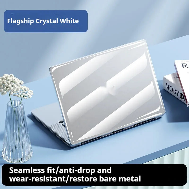 Transparent plastic hard shell case on a MacBook laptop showing the Apple logo through the clear cover.