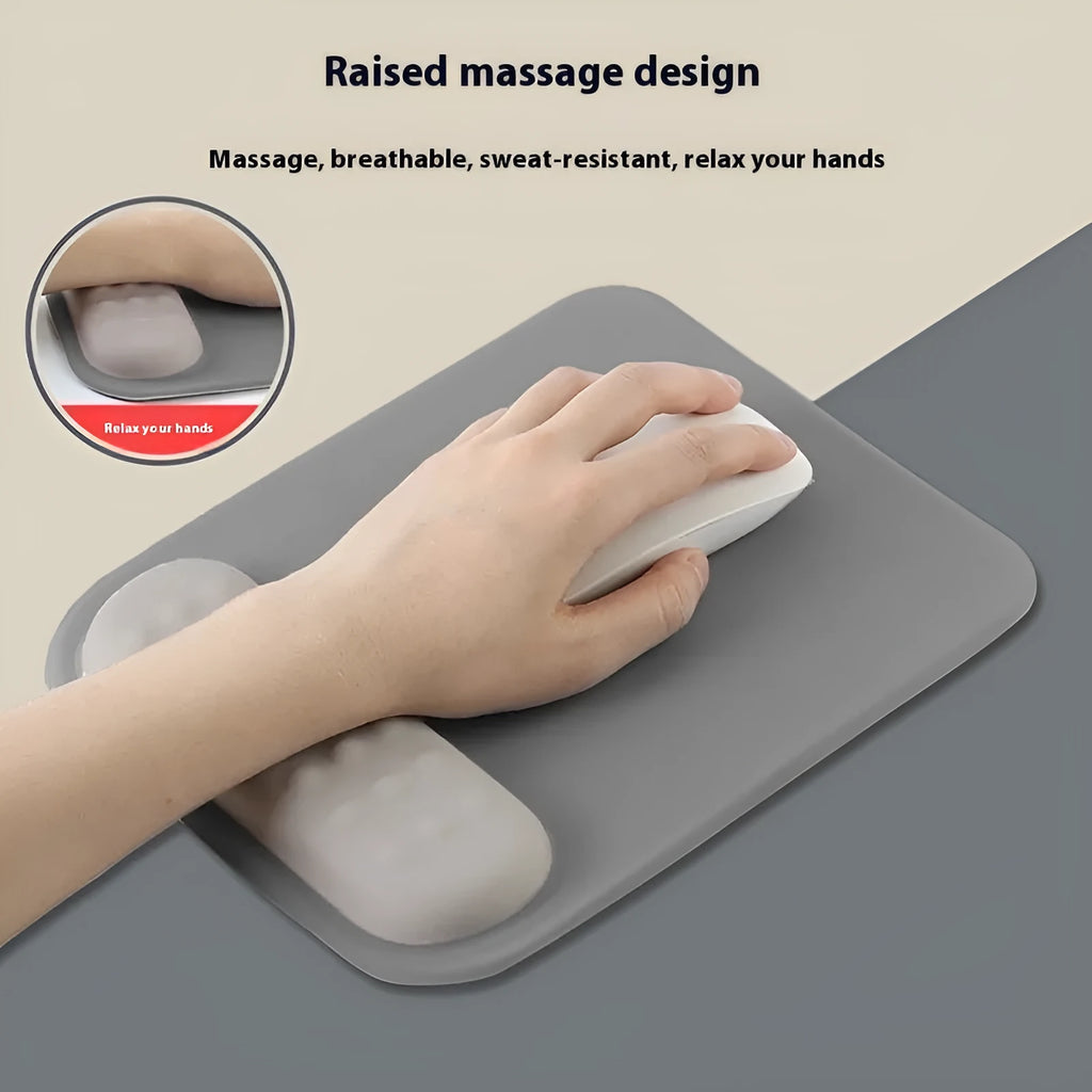 Ergonomic cloth-silicone mouse pad with raised wrist support on a desk