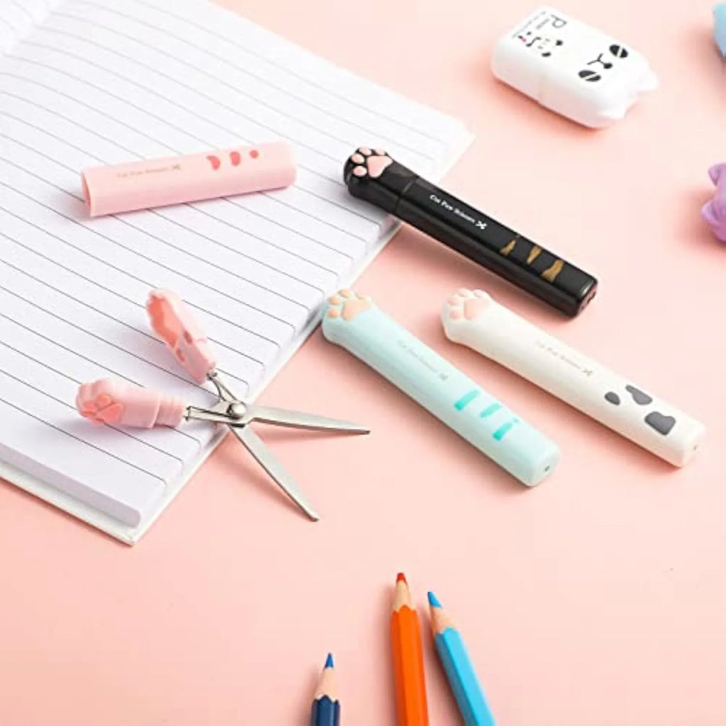Closed and open views of cute cat paw design mini folding scissors in various colours.