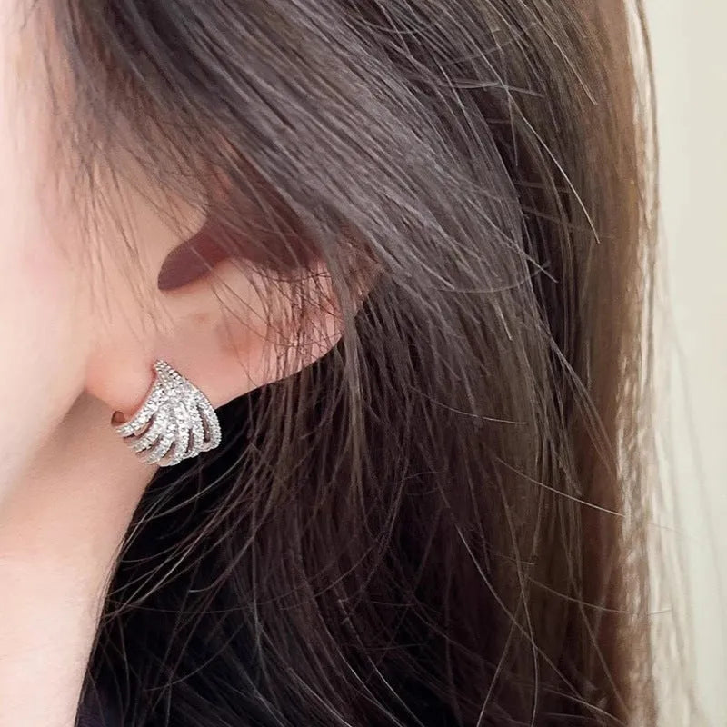 Geometric line design earrings with zircon stones and platinum electroplated finish