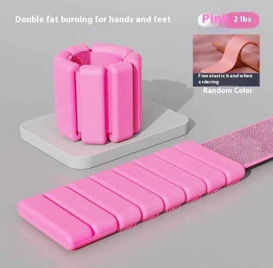 Silicone fitness weight bracelet with Velcro strap shown in black, blue, grey, or pink.