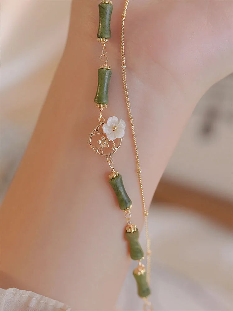 Handmade natural olivine bracelet with double layer twin bells design and olive branch pastoral details