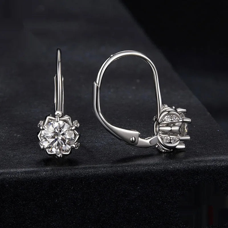 Sterling silver flower bud clip-on earrings with 0.5 carat moissanite centrepiece and white gold plating