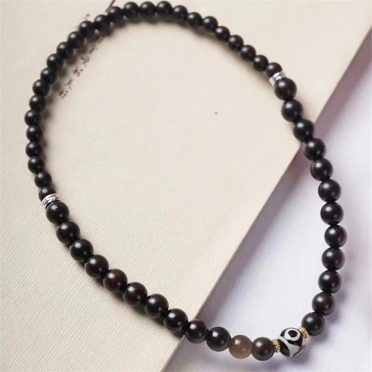 Ebony Tibetan bead bracelet with two circles of 8mm dark wood beads