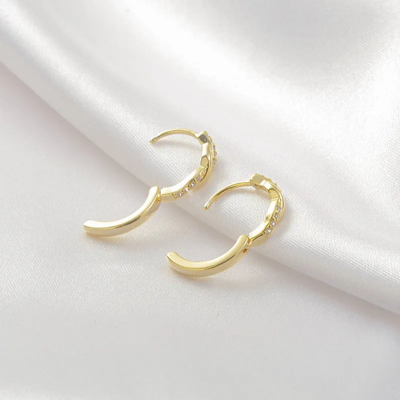 Geometric hemp rope earclip earrings with interwoven copper in gold and silver colours