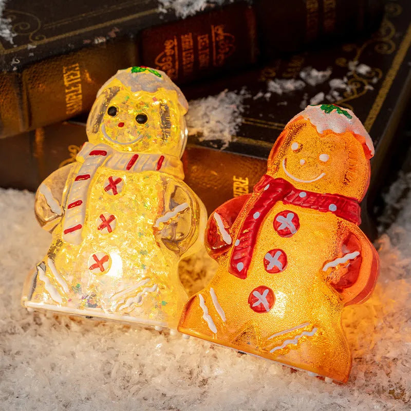 Glowing gingerbread man snowman Christmas ornament with LED lights in plastic construction