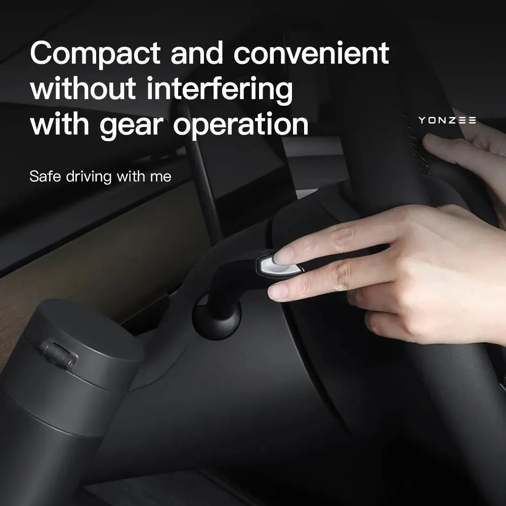 Plastic Tesla Model 3 and Y dashboard cup holder with a handle for left-hand drive cars.