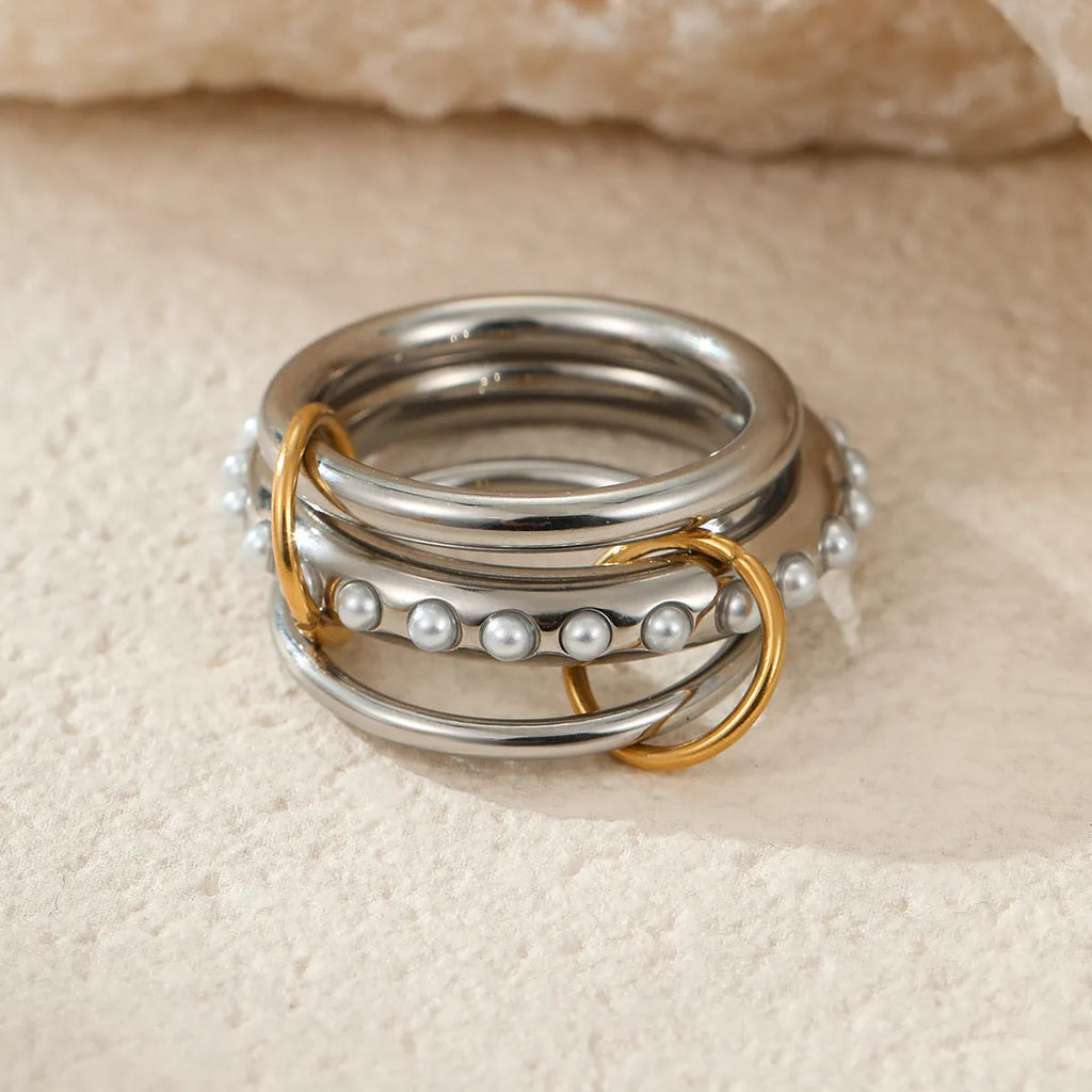 Stacked colour matching stainless steel ring set with 18K gold plating in three colour options