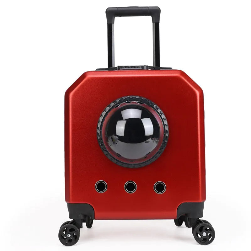 Hard-sided burgundy pet flight case on wheels with extendable handle for cat transport.