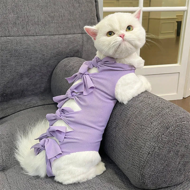 Lace-up polyester cat recovery suit for post-surgery care in blue, shown on a cat mannequin.