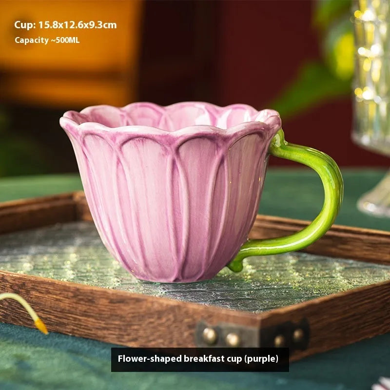 Ceramic breakfast cup with floral pastoral design showing red and purple colour options