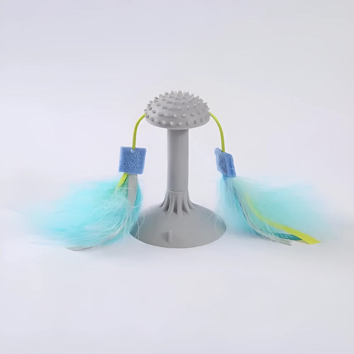 Blue cat toy wand with suction cup, double haired prick head, and plastic grinding teeth element.
