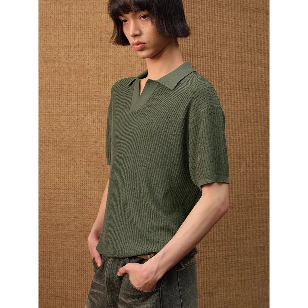 Men's creamy-white loose fit polo shirt with striped collar and short sleeves.