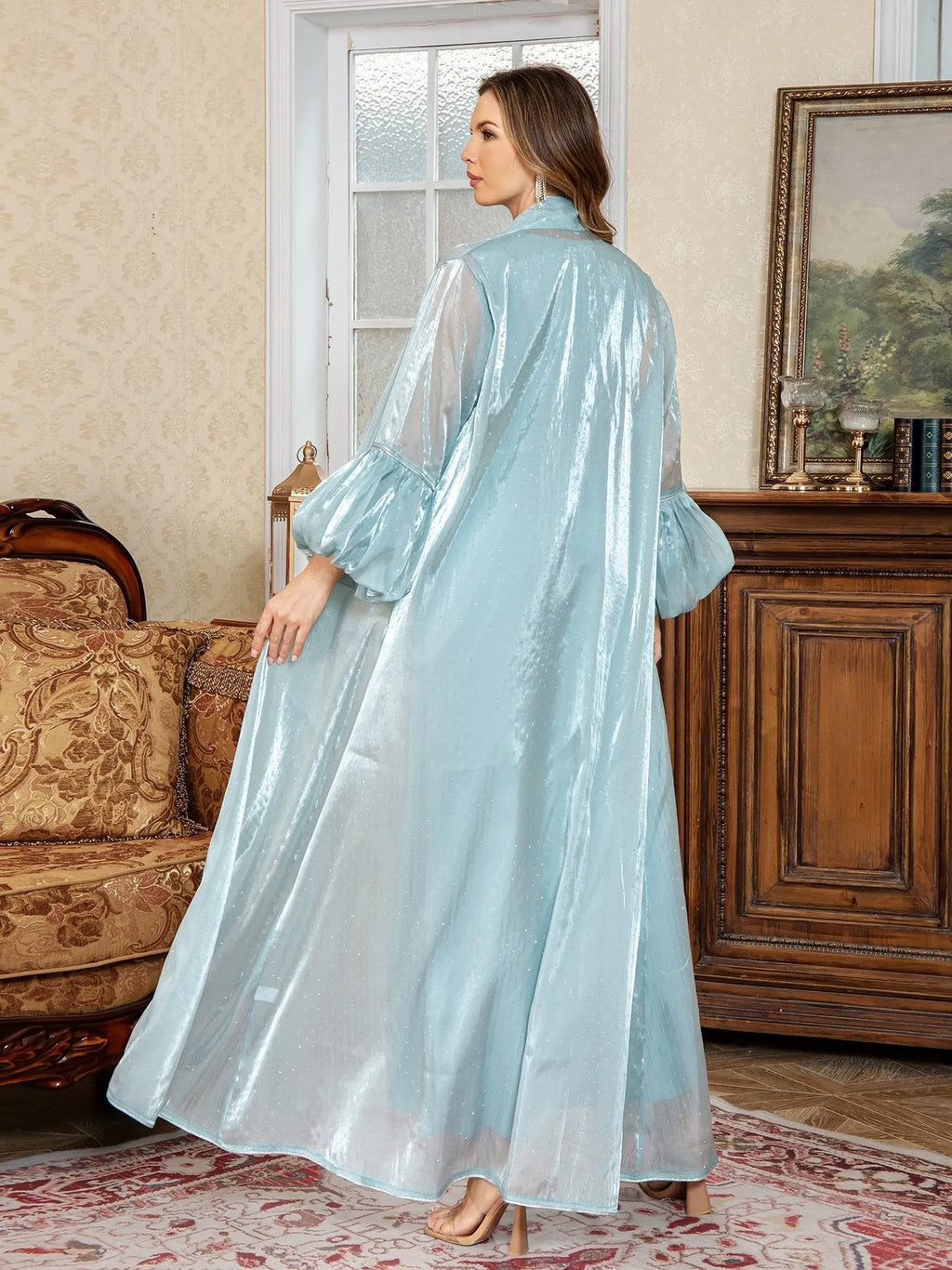 Arabic style two-piece evening dress with rhinestone embellishment and long sleeves in blue colour