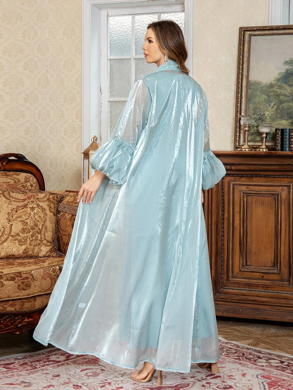 Arabic style two-piece evening dress with rhinestone embellishment and long sleeves in blue colour