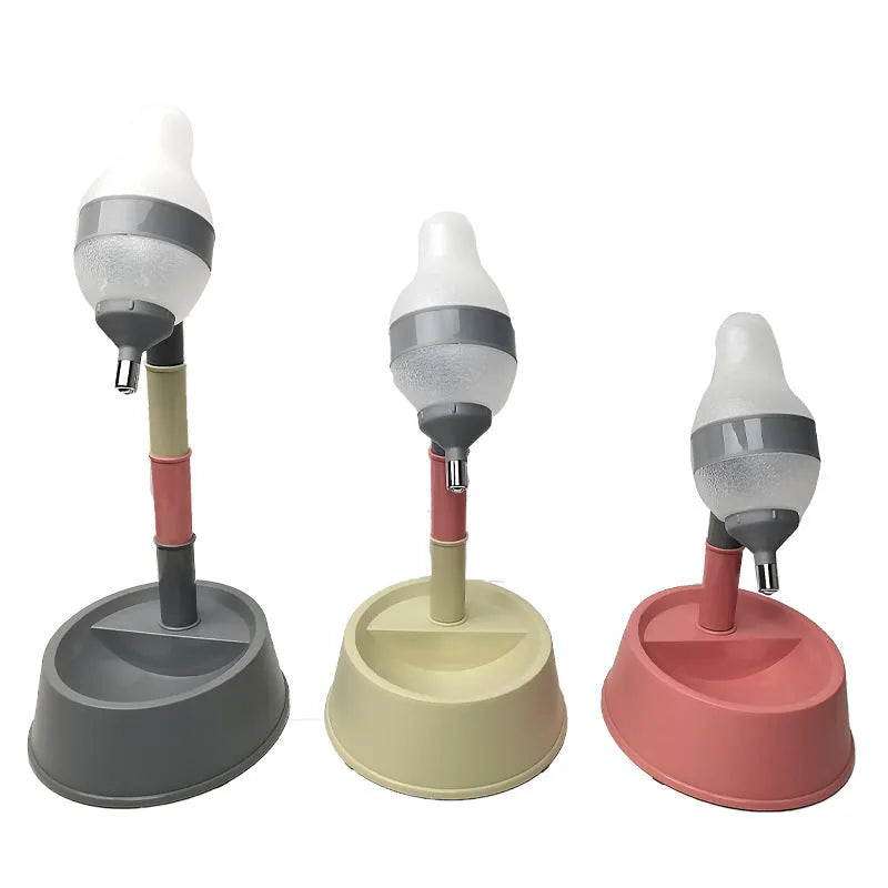 Green adjustable pet water dispenser with detachable pole and steel drinking nozzle on a grey floor.