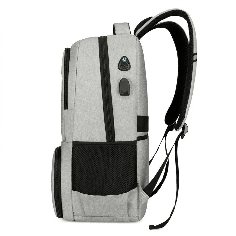 Light grey Oxford cloth picnic backpack with curved shoulder straps showing insulated compartments