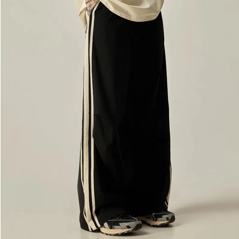 Black men's wide leg climbing pants with high waist and long straight-leg style made of polyester