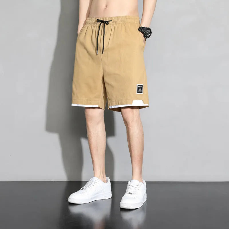 Cotton shorts for boys in plus sizes, shown in black, khaki, and white colours.