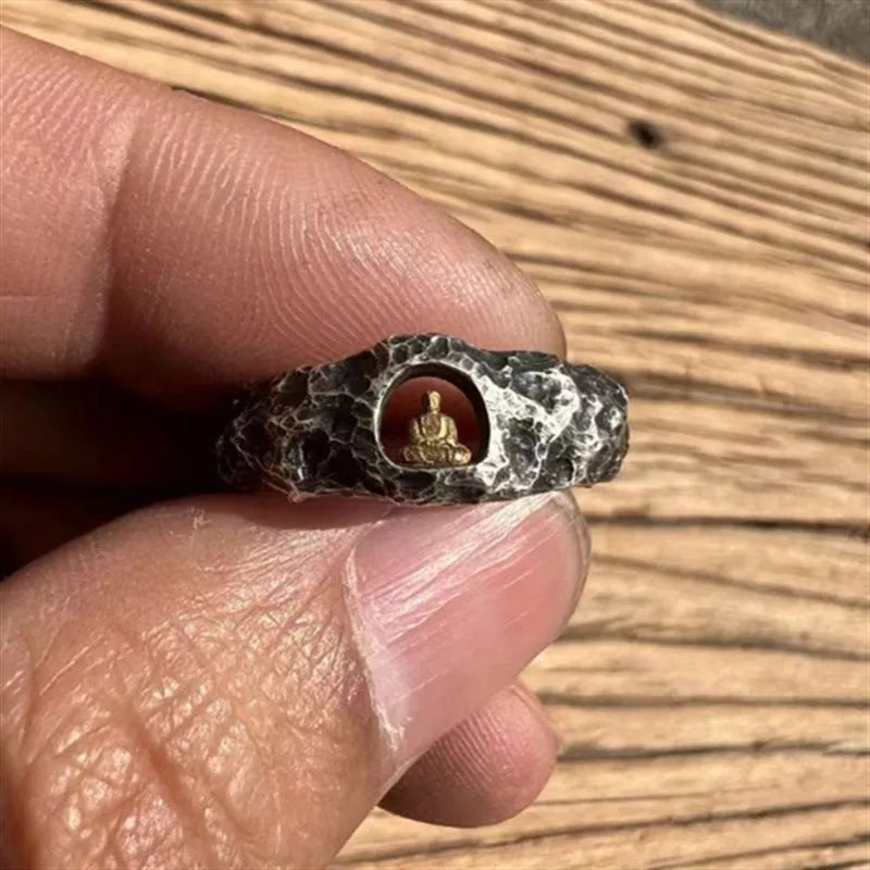 Hand-forged copper ring with rock texture featuring grotto Buddha design, shown in UK size 8