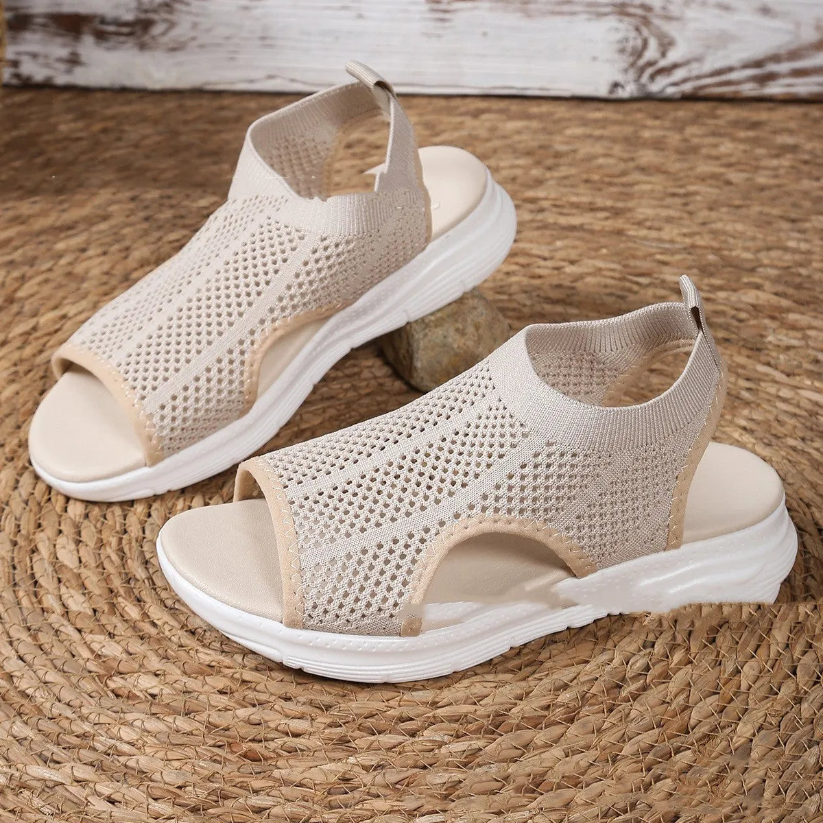Women's flat platform sports sandals in black with mesh lining and a rubber sole.