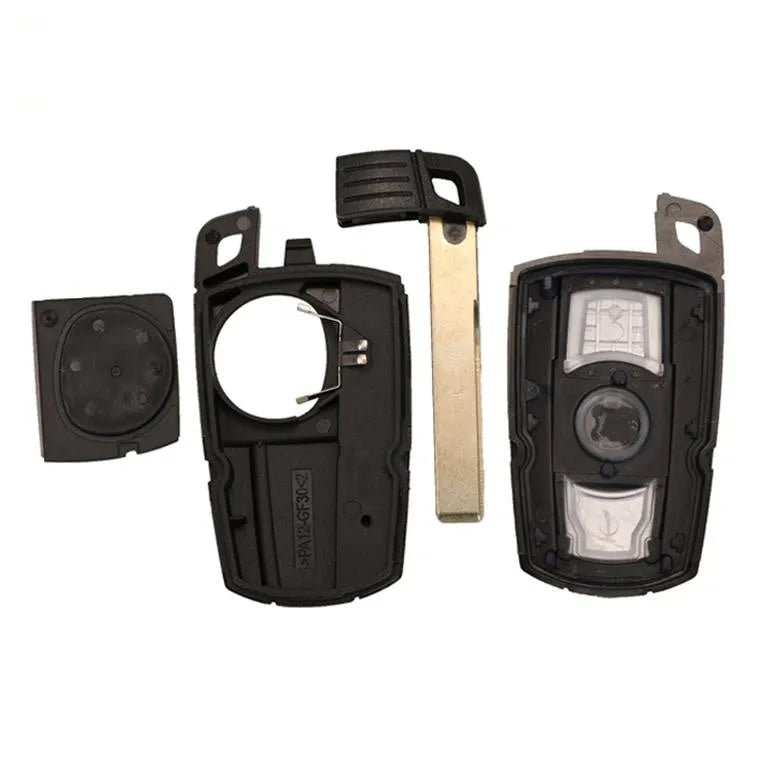BMW CAS3 semi-intelligent remote car key fob with three visible metal blades.