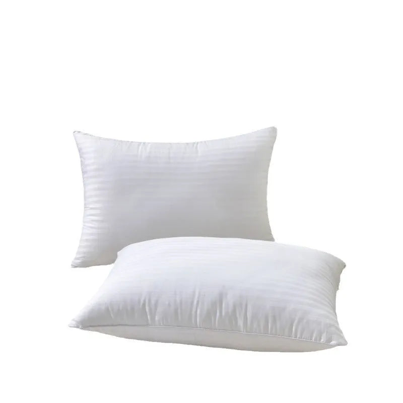 White cotton pillow with satin stripe pattern showing feather and cotton fill in three available sizes