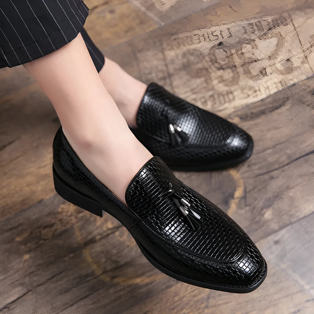 Men's black pointed toe slip on shoes with tassel decoration