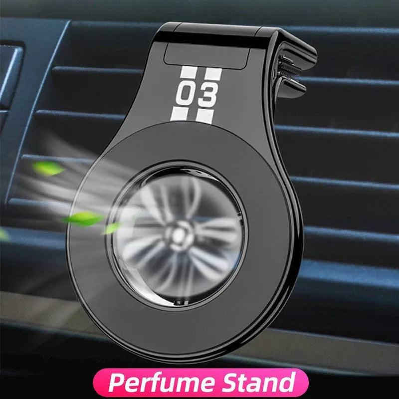 Magnetic car phone holder mounted on vehicle air vent with smartphone attached showing adjustable rotation mechanism