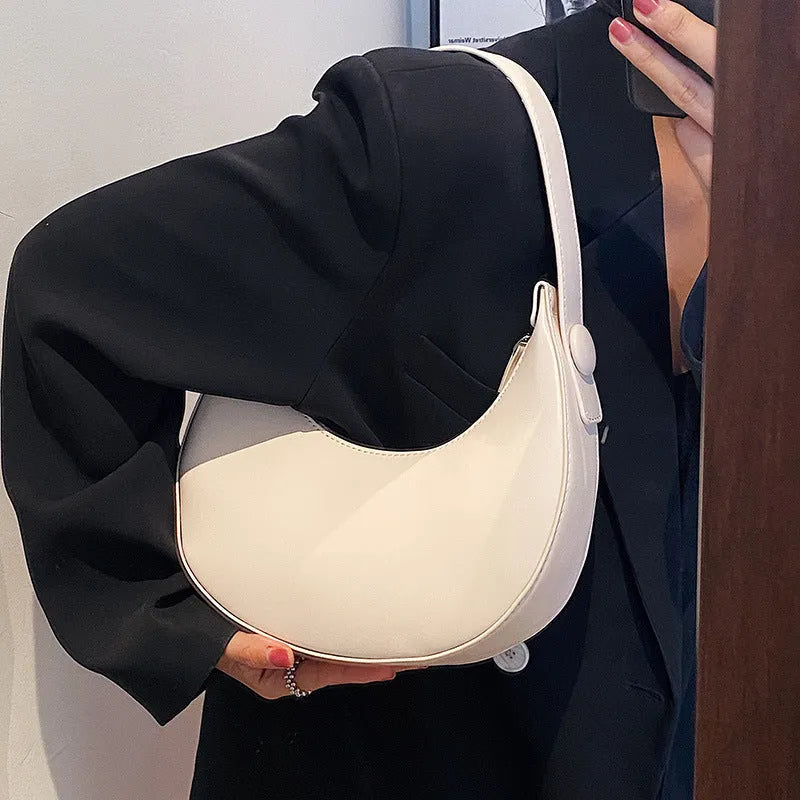 Women's PU dumpling shape shoulder bag in retro brown with zipper compartment, measuring 21x20x6cm