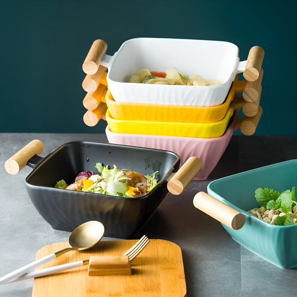 Modern ceramic bowl with irregular organic shape and coordinating lid in porcelain