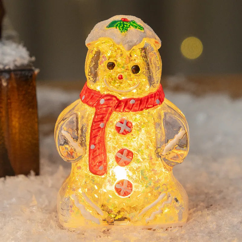 Glowing gingerbread man snowman Christmas ornament with LED lights in plastic construction