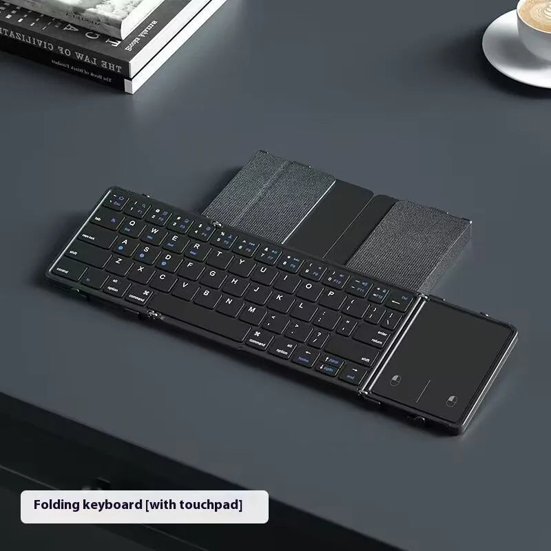 Black foldable Bluetooth keyboard for mobile devices with mute keys