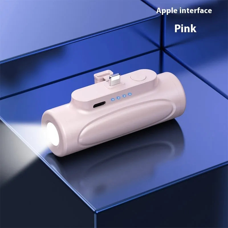 Black and pink creative power bank with LED flashlight, showing dimensions and USB-C or Apple port options.