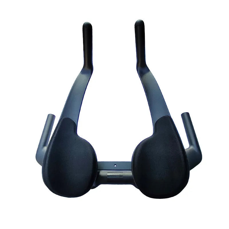 Black carbon fibre time trial bicycle handlebar showing aero extensions and central clamp area.