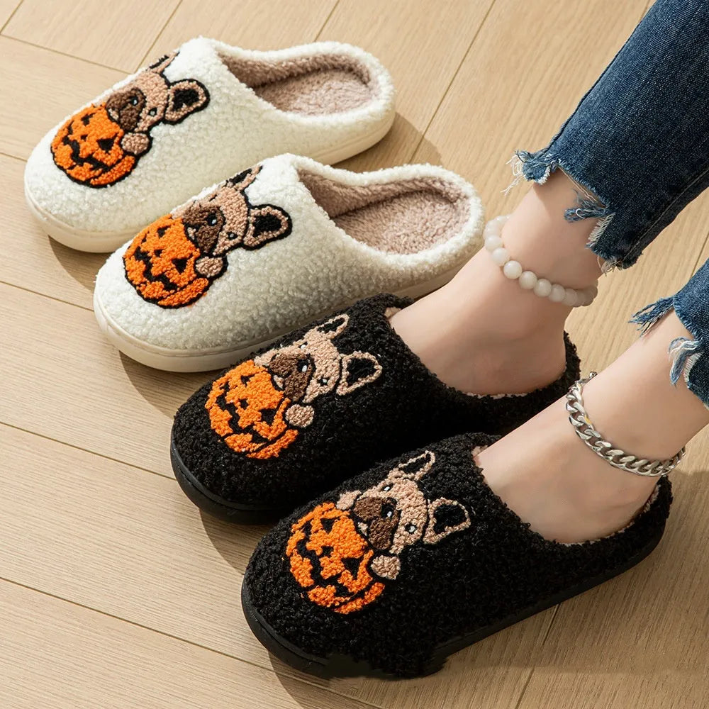 Halloween pumpkin design plush slippers with black velvet upper and TPR rubber sole.