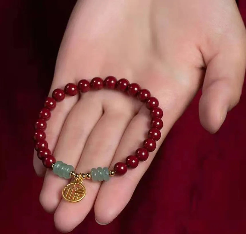 Handcrafted wave-shaped bracelet made from cinnabar and copper beads in national style