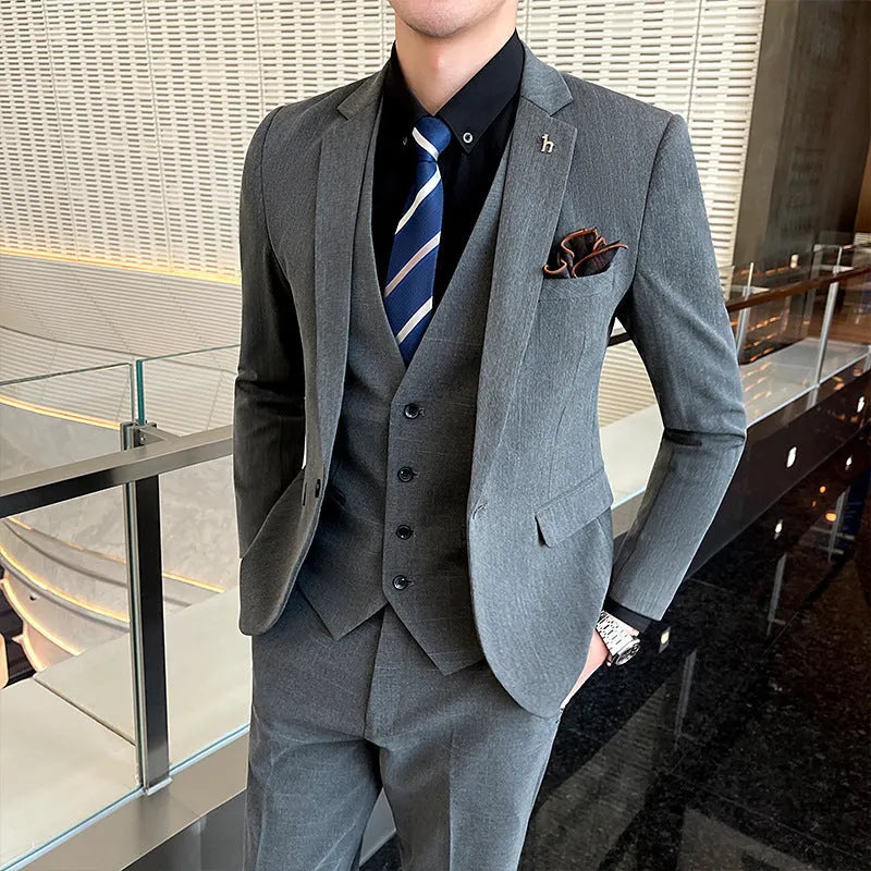 Slim fit British style men's business suit in black or dark grey cotton blend fabric