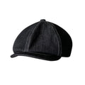 Black cotton retro beret with octagonal silhouette shown on model, unisex adult design