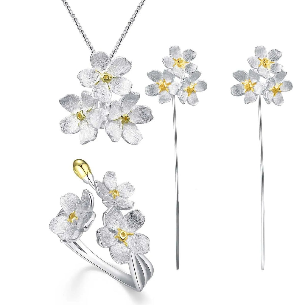 Sterling silver Myosotis Sylvatica flower pendant with electroplated gold or silver finish, pastoral style.