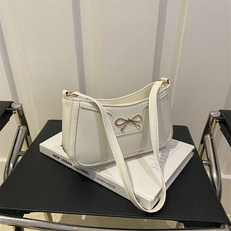 PU leather western style baguette shoulder bag with bow detail in horizontal square silhouette