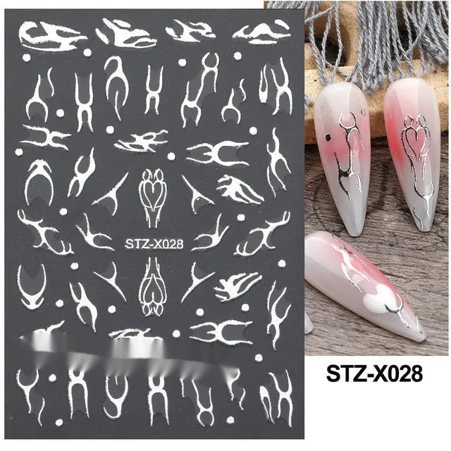 Cartoon love pattern nail art sticker decals in black and silver colours on a plastic sheet.