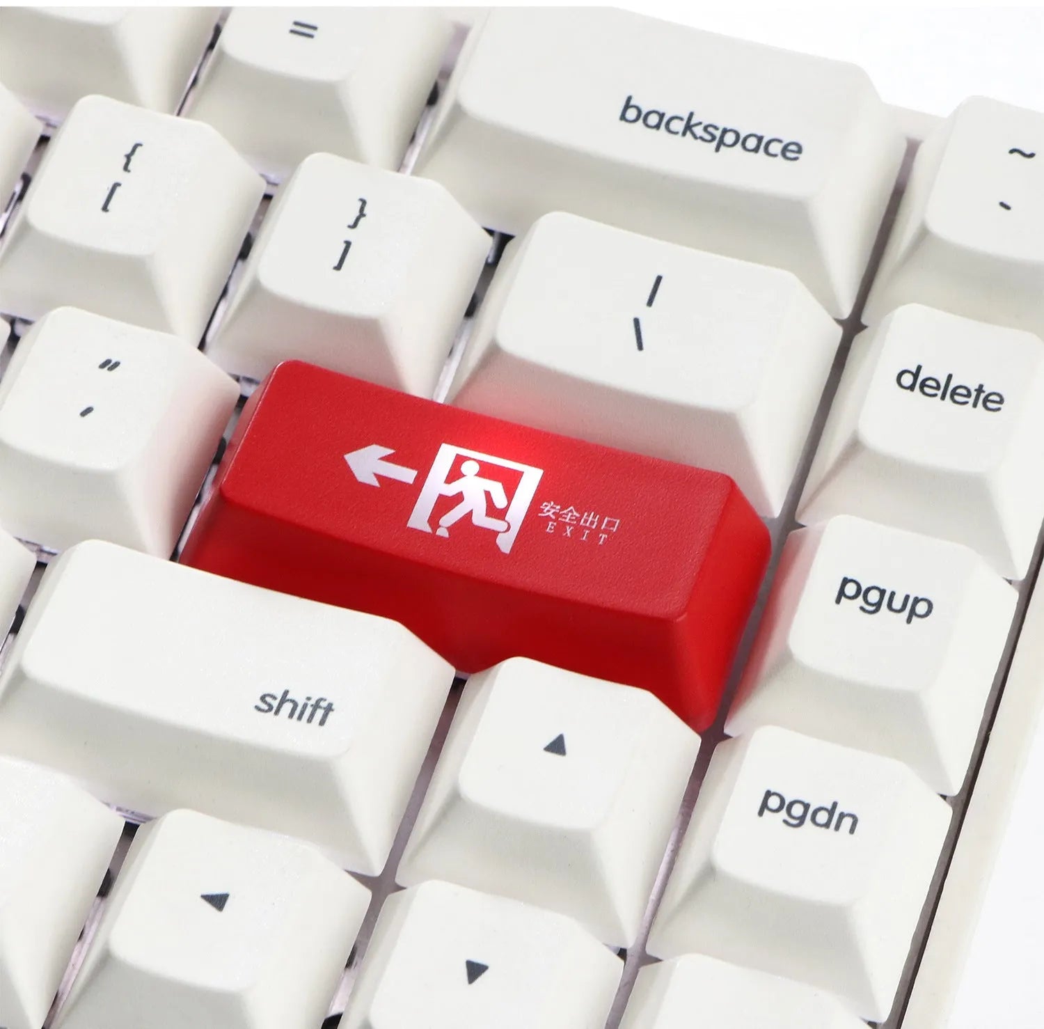 Transparent mechanical keyboard keycap with safety evacuation exit icon in red or black